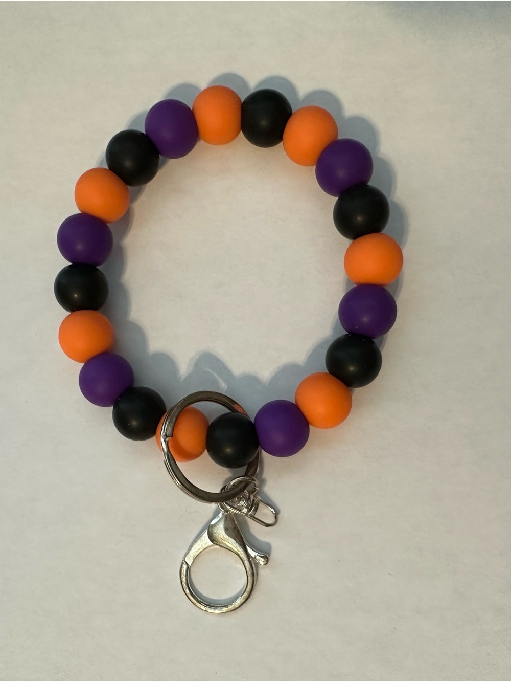 Round Beaded Keyring Bracelet in Orange, Purple & Black